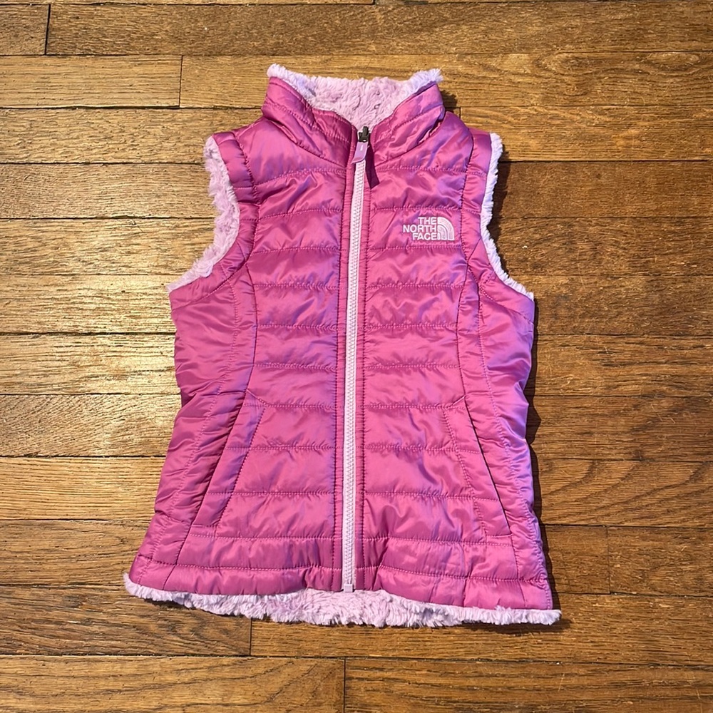 Girls North Face Reversible Vest.